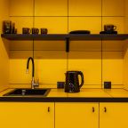 Общая кухня для гостей отеля