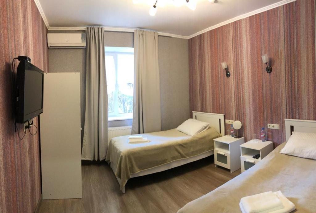 Двухместный (Стандартный двухместный номер с 2 отдельными кроватями) отеля Аврора Спортивно-гостиничный комплекс, Балашиха