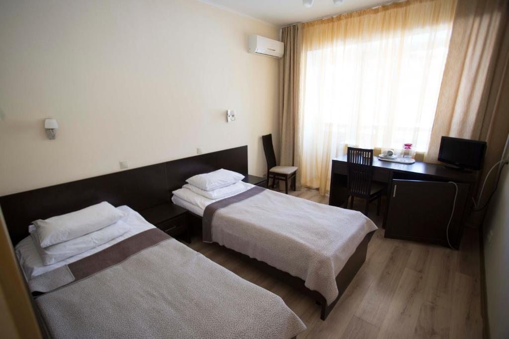 Двухместный (Стандартный двухместный номер с 2 отдельными кроватями, лечение включено) курортного отеля Дубки, Ундоры