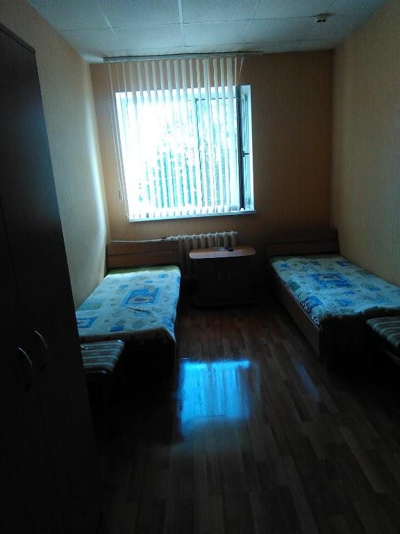 Двухместный (Двухместный номер с 2 отдельными кроватями и общей ванной комнатой) отеля Эдем, Унеча