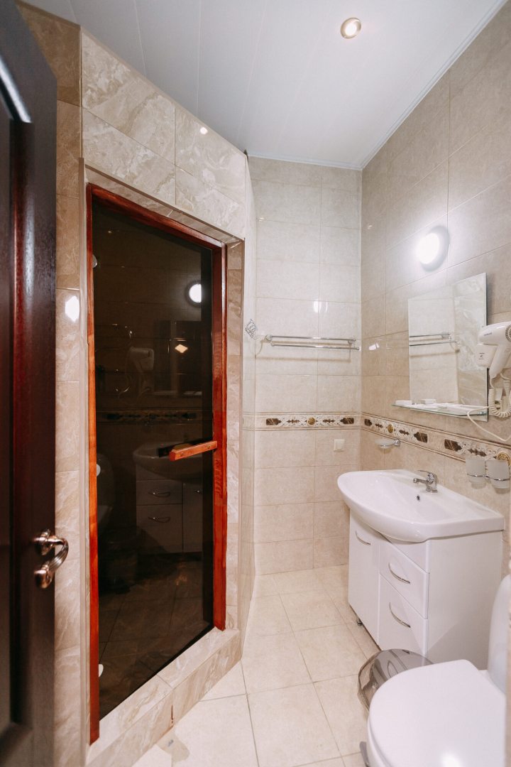 Ванная комната в гостинице Kunlun, Бородино. Гостиница Kunlun