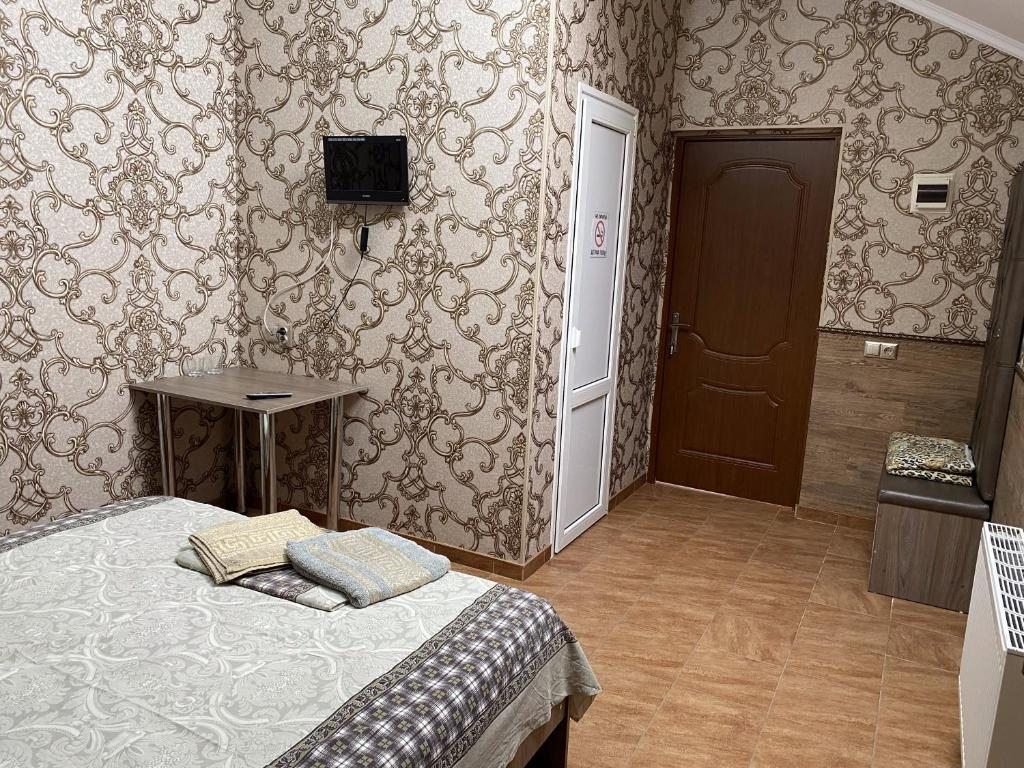 Двухместный (Двухместный номер с 1 кроватью и собственной ванной комнатой) мотеля Guest House Uyut, Аксай