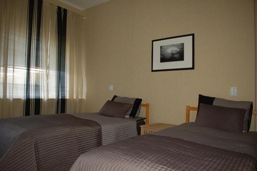 Двухместный (Двухместный номер эконом-класса с 2 отдельными кроватями) отеля Форест, Верхошижемье