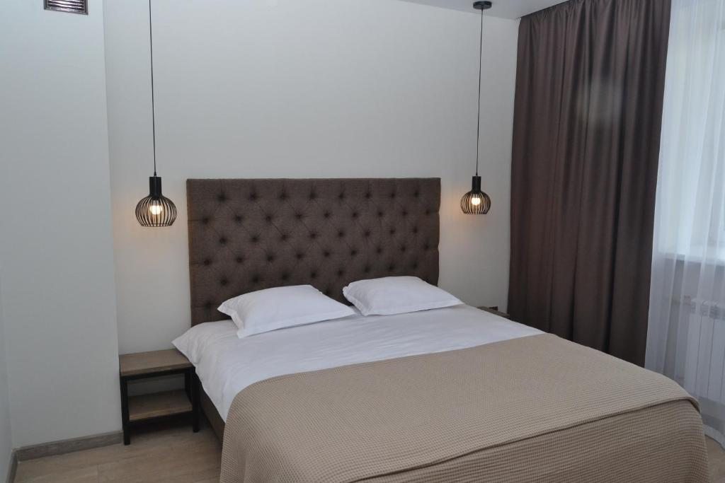 Двухместный (Улучшенный номер с кроватью размера «king-size») отеля Фермер House, Еткуль