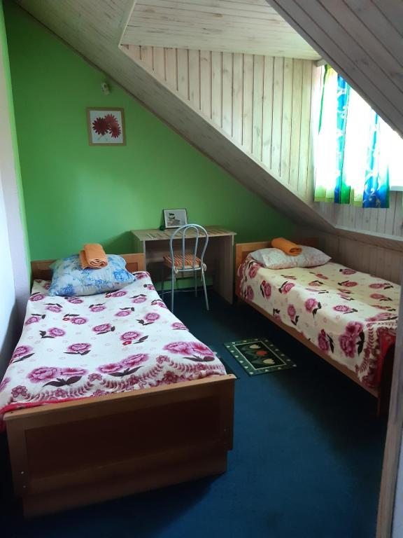 Двухместный (Двухместный номер с 2 отдельными кроватями и ванной комнатой) отеля Zaytseva Gora Hotel, Зайцево