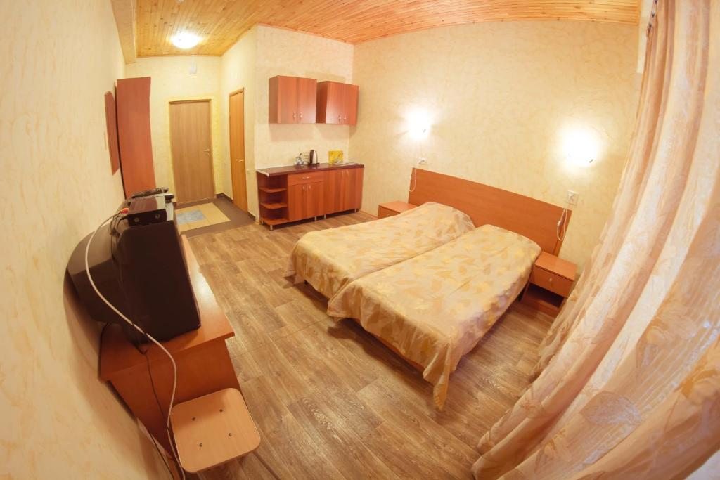 Двухместный (Стандартный двухместный номер с 2 отдельными кроватями) гостиницы Смайл, Абзаково