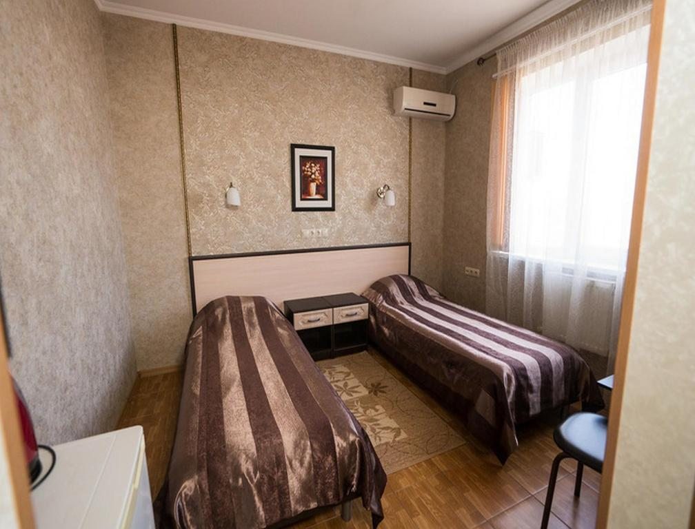 Двухместный (Бюджетный двухместный номер с 2 отдельными кроватями) отеля Комфорт, Тимашевск