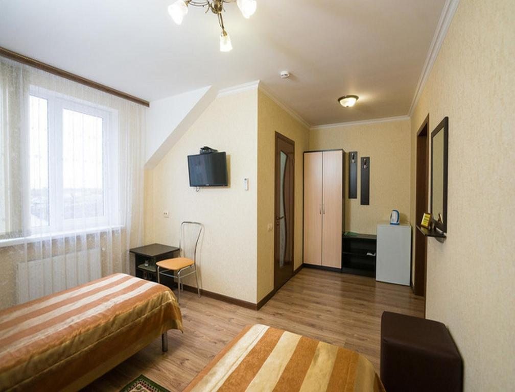 Двухместный (Бюджетный двухместный номер с 2 отдельными кроватями) отеля Комфорт, Тимашевск