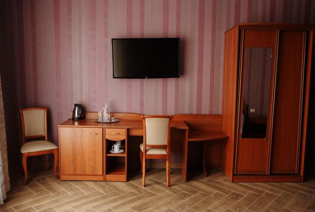 Двухместный (Двухместный номер с 2 отдельными кроватями и ванной комнатой) отеля Сарапулъ