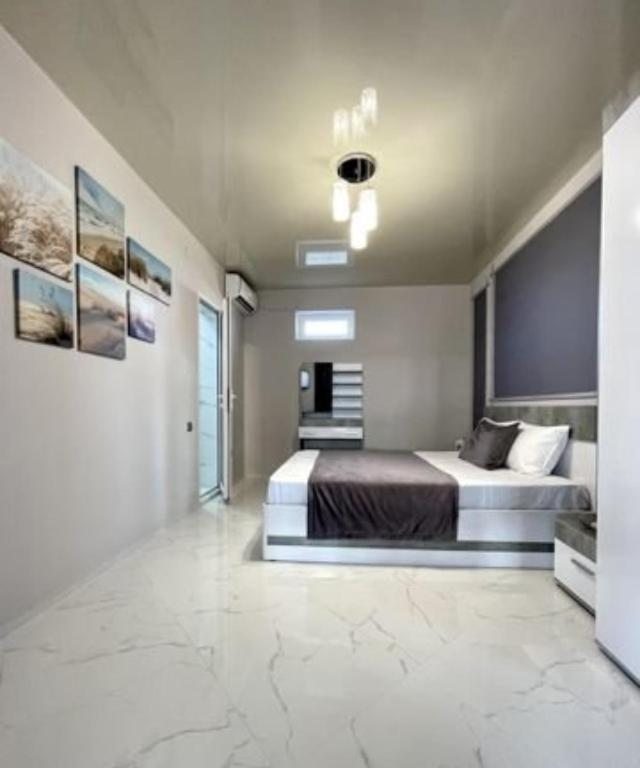 Двухместный (Двухместный номер с 1 кроватью и собственной ванной комнатой) гостевого дома Римини, Избербаш