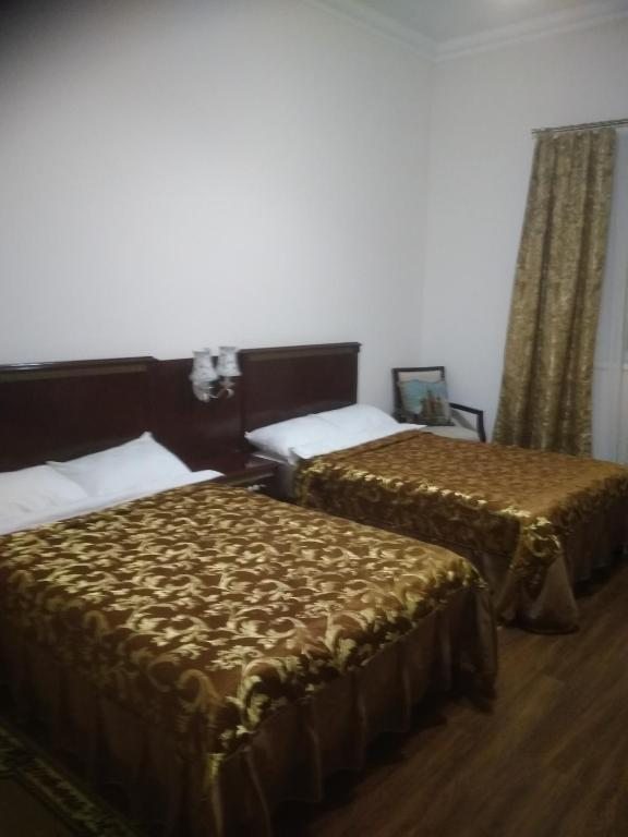 Двухместный (Стандартный двухместный номер с 2 отдельными кроватями) отеля Пирани, Лихославль