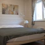 Трёхместный и более, Гостевые дома Нордик