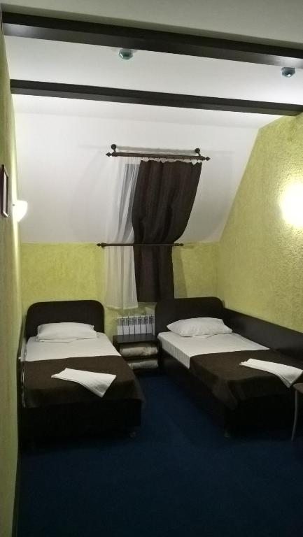 Двухместный (Двухместный номер с 2 отдельными кроватями) мотеля Мельница, Дубовка