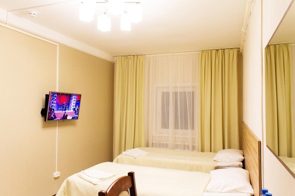 Двухместный (Двухместный номер с 2 отдельными кроватями) гостиницы Пинежская Слобода, Карпогоры