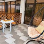 Трёхместный комфорт с общей террасой