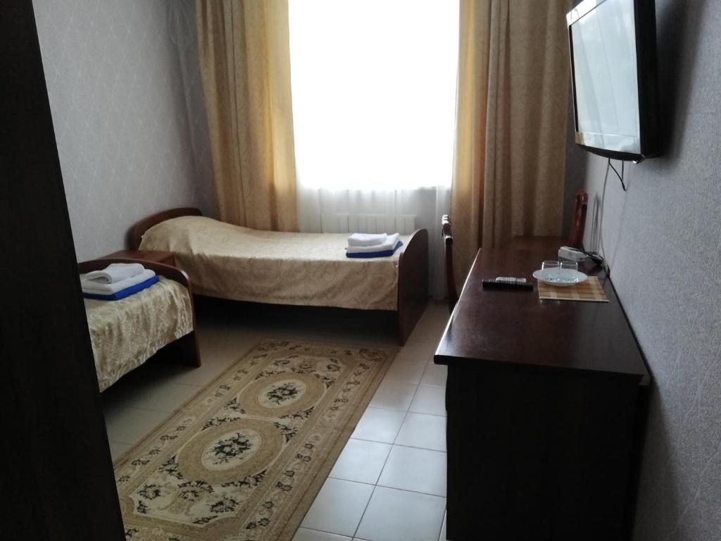 Двухместный (Двухместный номер с 2 отдельными кроватями) отеля Kaspiy Hotel, Избербаш