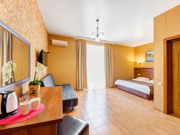 Фотография номера гостиницы Gold Compas