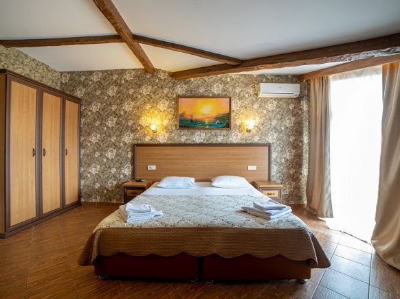 Фотография номера гостиницы Gold Compas