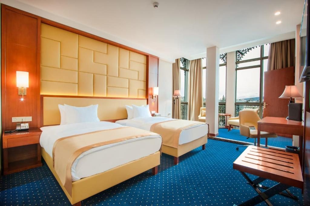 Двухместный (Улучшенный двухместный номер с 2 отдельными кроватями) отеля New Tiflis Hotel, Тбилиси
