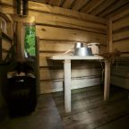 Внутри бани установлена печь на дровах и есть необходимые мелочи для бани