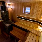 Парная с русской печкой, обложенной камнем змеевик