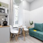 Номер-студио с кроватью на втором ярусе и диваном на первом