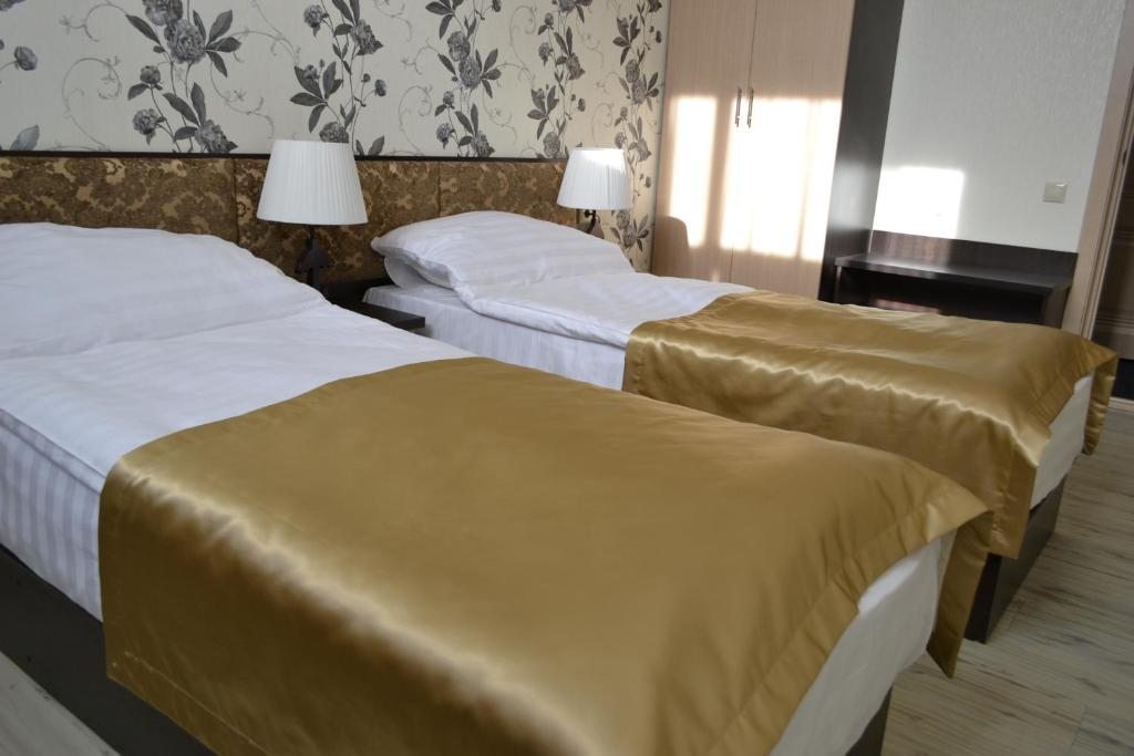 Двухместный (Двухместный номер «Комфорт» с 1 кроватью или 2 отдельными кроватями) отеля Эстет, Ессентуки