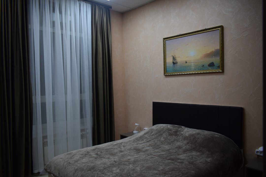 Двухместный (Стандартный двухместный номер с двуспальной кроватью (общая ванная комната)) арт-отеля Центр CITY, Козьмодемьянск