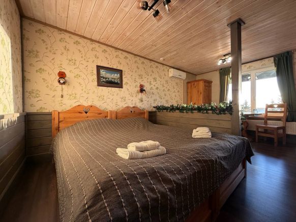 Фотография номера мини отеля Времена года