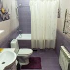 Ванная комната в уютном семейном номере Люкс