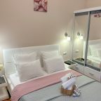 Апартаменты (Апартаменты 4 с двумя спальнями и диваном на кухне), Апартаменты Сан Сити Апартментс Пионерский