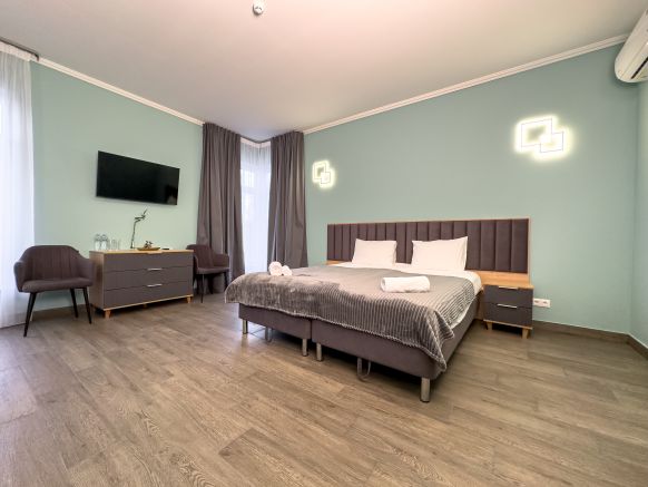 Фотография номера гостиницы За поводом