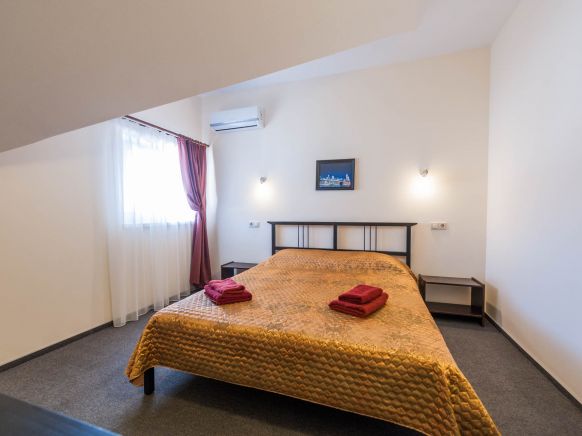 Фотография номера гостиницы Туристическая база Парус