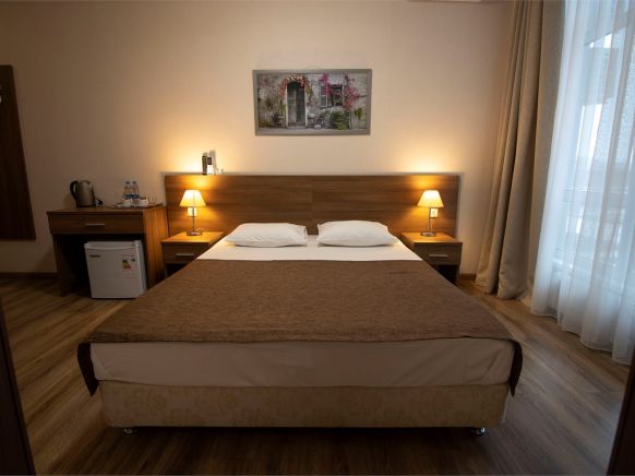 Фотография номера гостиницы Атмосфера