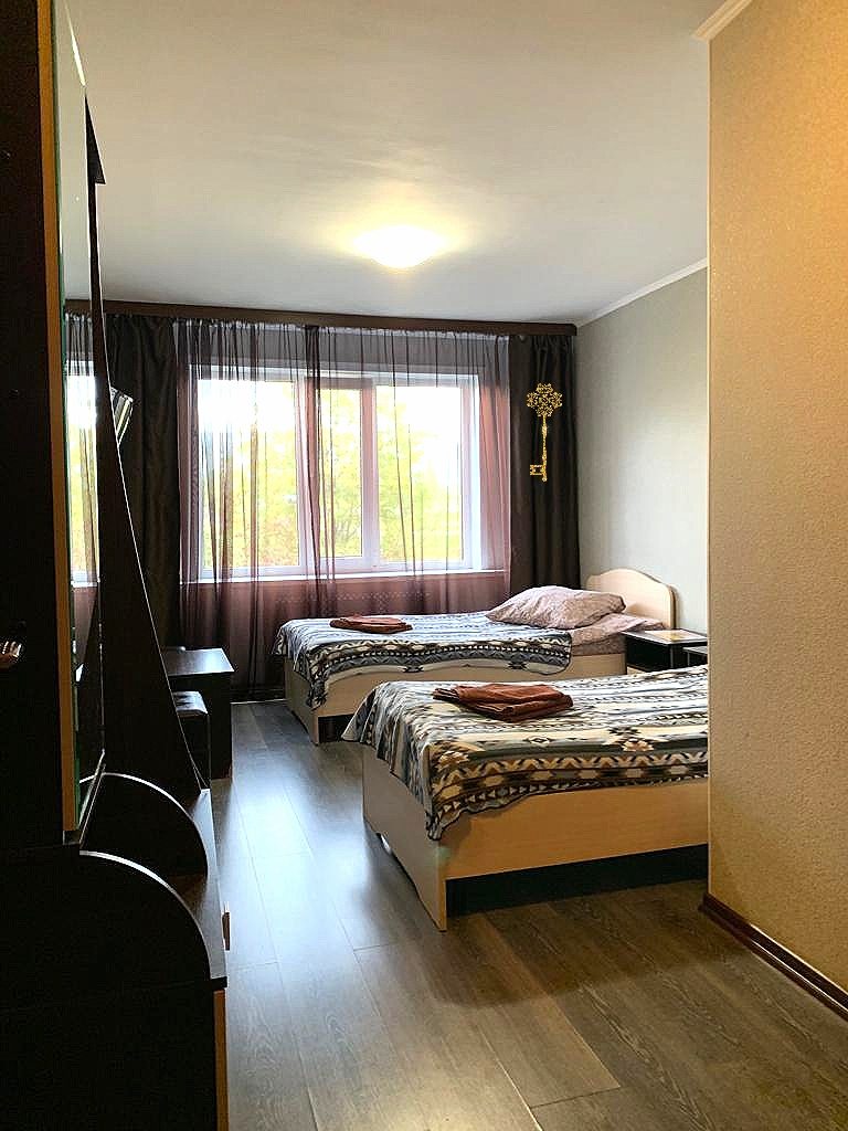 Двухместный (Двухместный номер с двуспальной кроватью  и своими удобствами в номере) мини-отеля Khol.in hotel, Сыктывкар