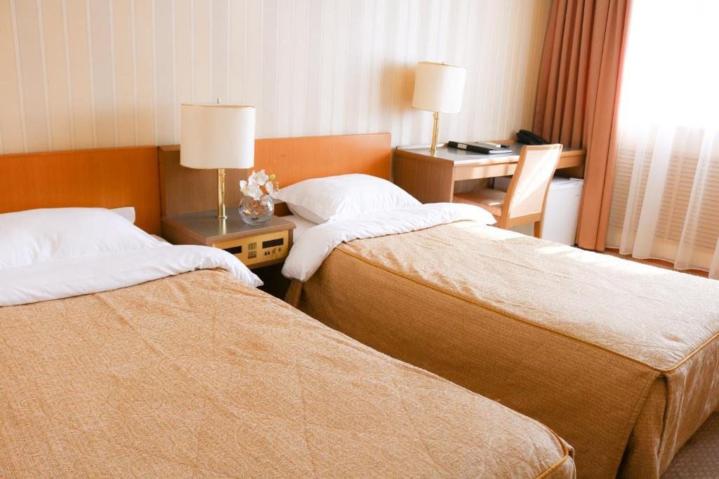 Двухместный (Стандартный двухместный номер с 1 кроватью или 2 отдельными кроватями) отеля Гавань, Владивосток