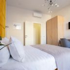 Просторные апартаменты с двумя спальнями с видом на город