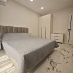 Апартаменты (Новые трёхкомнатные апартаменты с видом на море. Корпус Марио 16), Гостевой дом Madisson Rodina