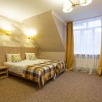 Комфортный номер с четырьмя односпальными кроватями