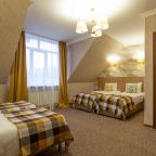 Комфортный номер с четырьмя односпальными кроватями