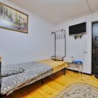 Четырехместный (С раздельными кроватями и собственными удобствами,с телевизором и видом на горы), База отдыха Архыз Сити Софийская поляна