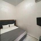 Двухкомнатный номер с сауной и джакузи. Спальня