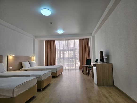 Фотография номера гостиницы Брасс Фэмили отель