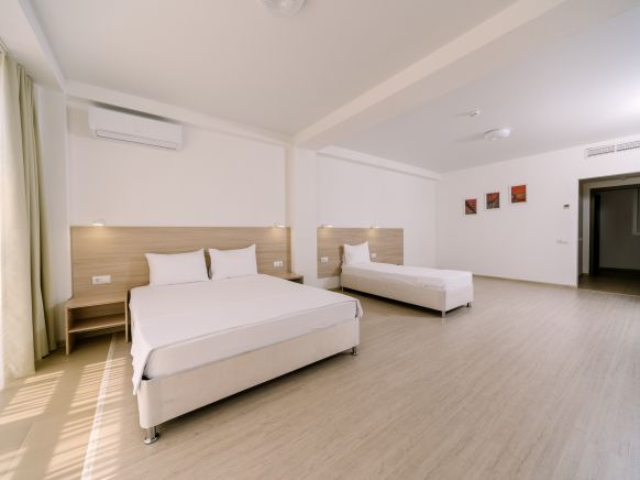 Фотография номера гостиницы Брасс Фэмили отель