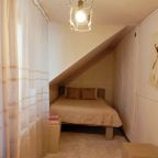 Спальня с двух местной кроватью