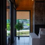 Коттедж (Большой дом на 2 спальни с камином, сауной и чаном (6+2)), База отдыха Карелия Парк