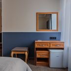 Светлый и просторный номер с удобной кроватью, телевизором и