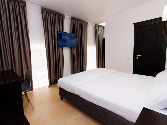 Фотография номера апарт отеля Люди