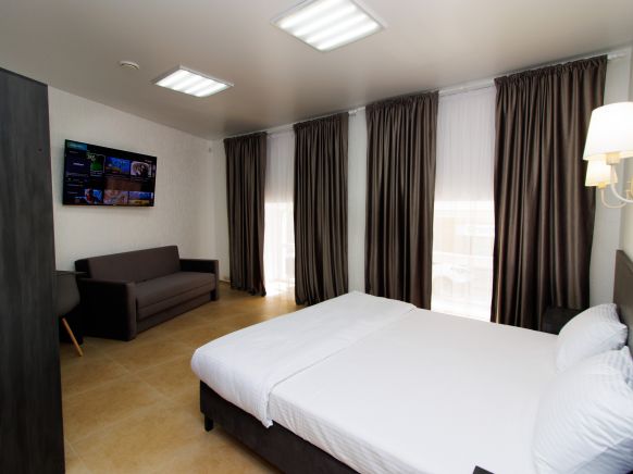 Фотография номера апарт отеля Люди