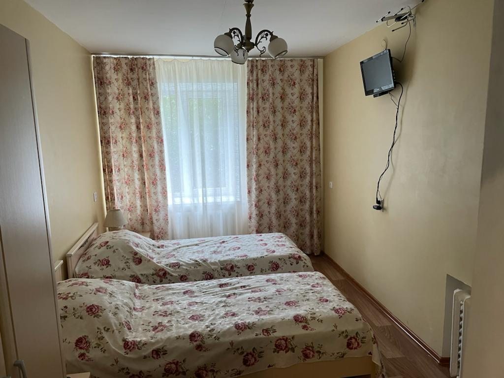Двухместный (Двухместный номер эконом-класса с двумя раздельными кроватями) мини-отеля Вышка, Псков